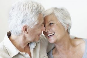 elderly Couple Holding Each other